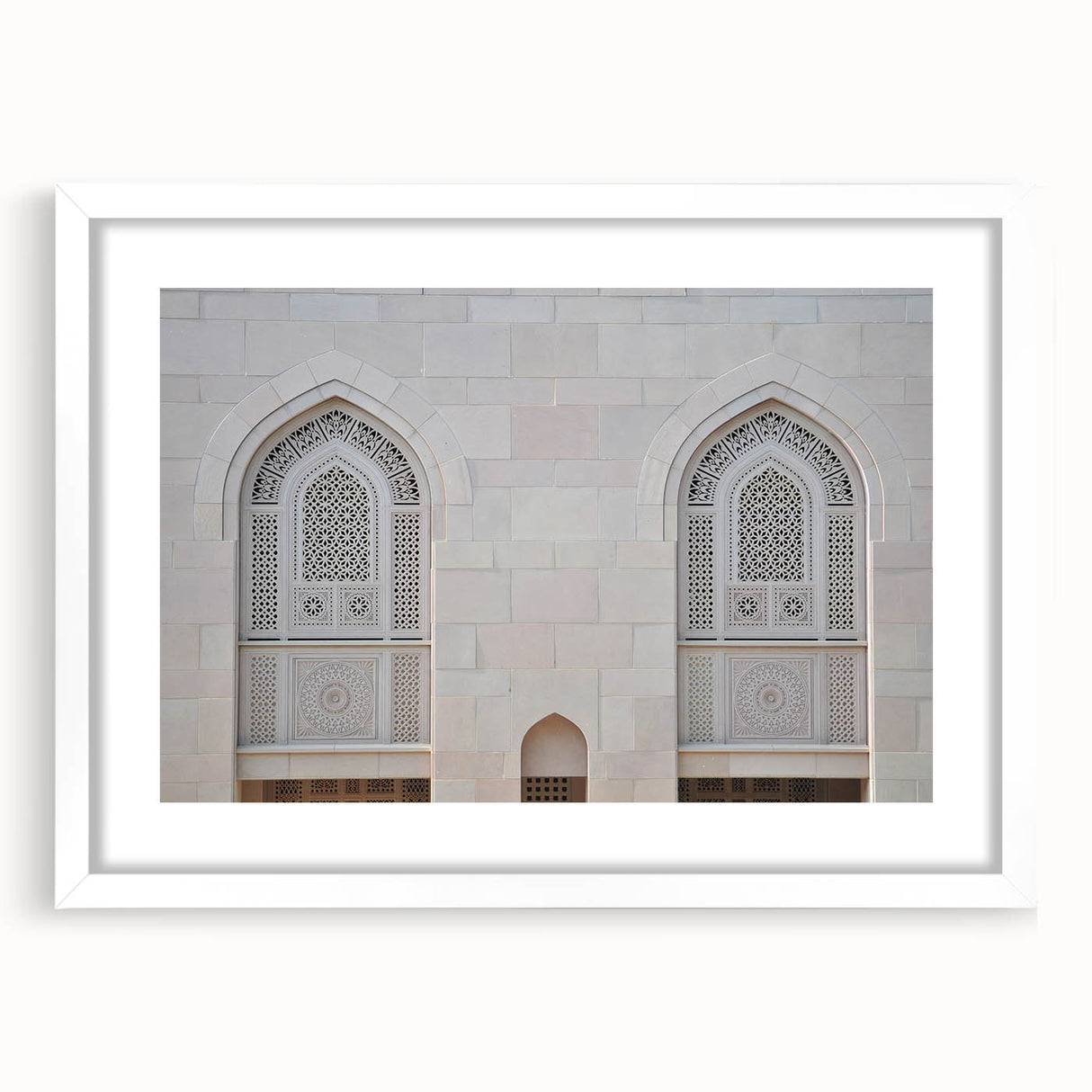 Abstract art print of a Middle Eastern landscape in muted earth tones on a framed white mat, ideal for dining room decor.