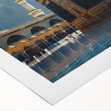 Art deco poster depicting a stylized Saudi Arabian landscape in muted earth tones on rolled canvas.