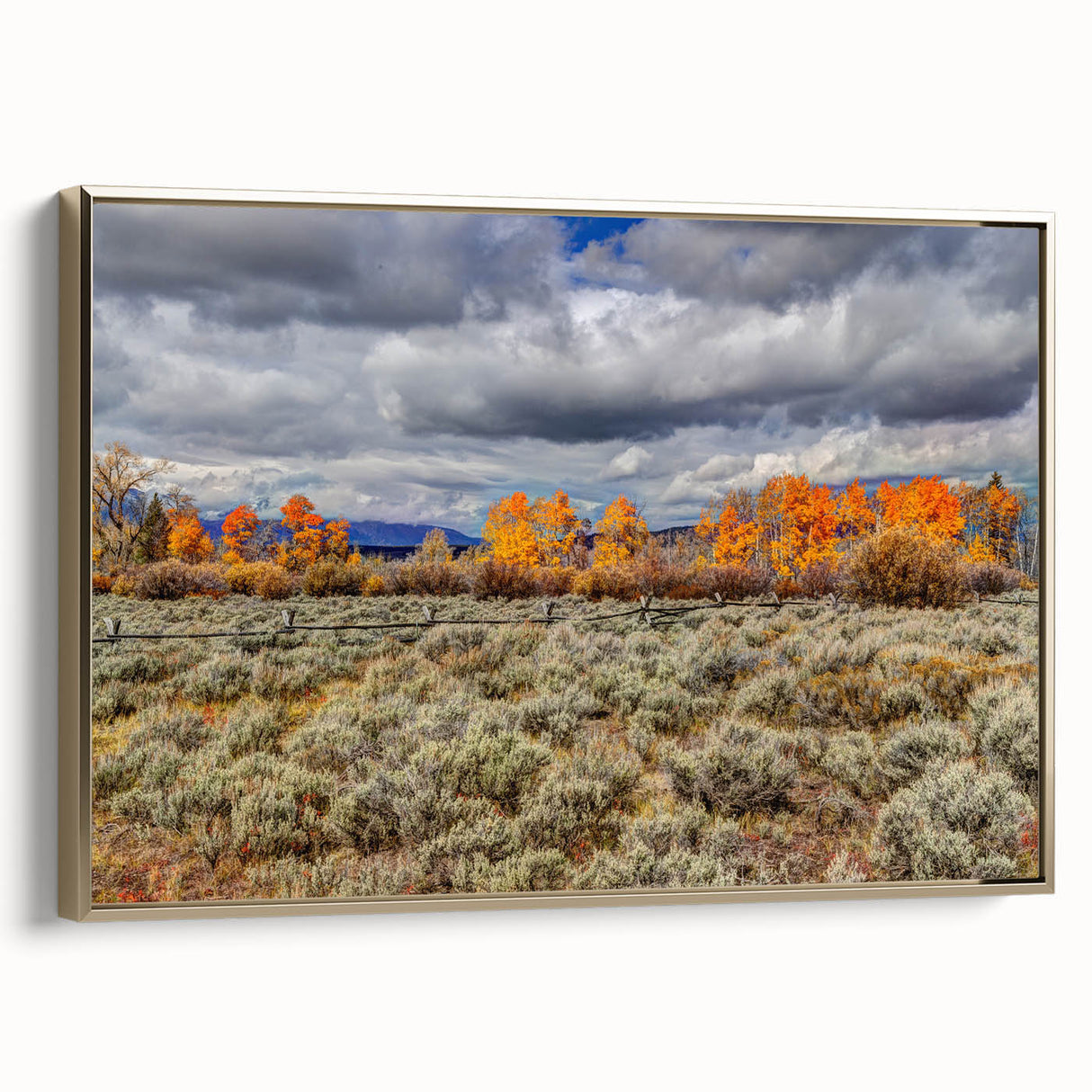 Framed canvas featuring a vintage-style landscape painting of Idaho scenery in muted earth tones.