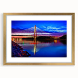 Extra large abstract art print of Kansas scenery in muted earth tones on a textured canvas, framed in gold.