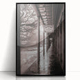 Large abstract wall art depicting a stylized New Orleans scene in muted earth tones, framed in black acrylic.