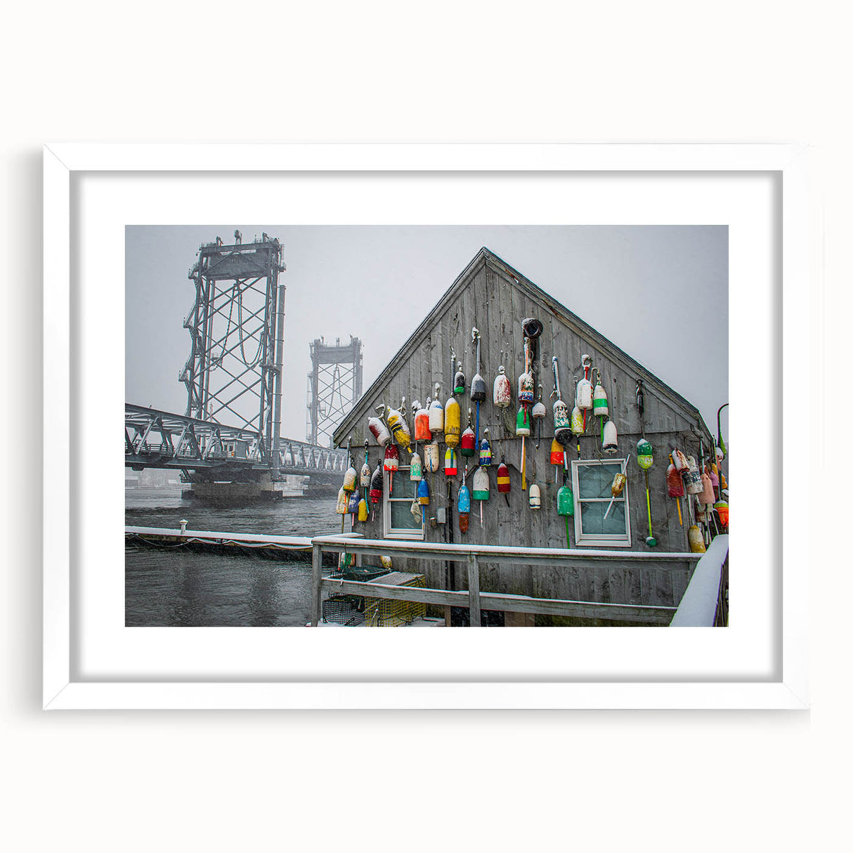 Abstract art print of Maine scenery in muted blue and green tones, framed with a white mat.