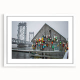 Abstract art print of Maine scenery in muted blue and green tones, framed with a white mat.