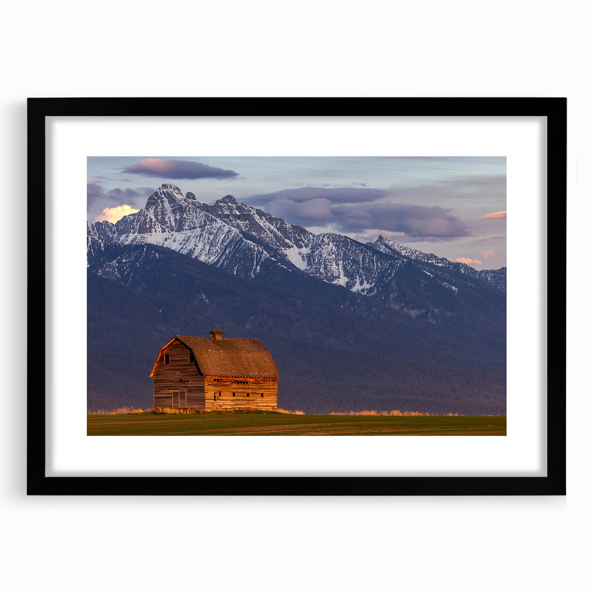 Extra large, textured abstract art print of colorful Montana scenery on a black framed canvas, ideal for living room decor.