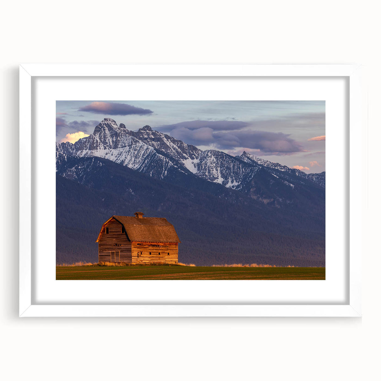 Abstract art print depicting a serene Montana landscape in muted earth tones, framed with a white mat.