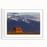 Abstract art print depicting a serene Montana landscape in muted earth tones, framed with a white mat.