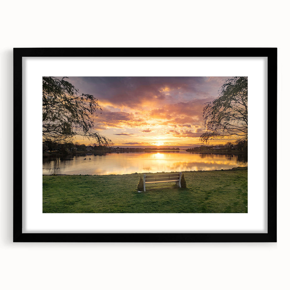 Extra large abstract art print of colorful, textured scenery, framed in black, ideal for living room decor.