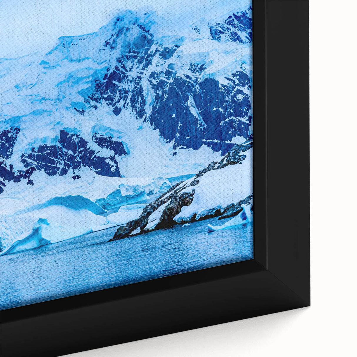 Close-up of textured black wall art featuring a colorful Charlotte skyline on a large framed canvas.