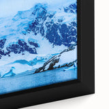 Close-up of textured black wall art featuring a colorful Charlotte skyline on a large framed canvas.