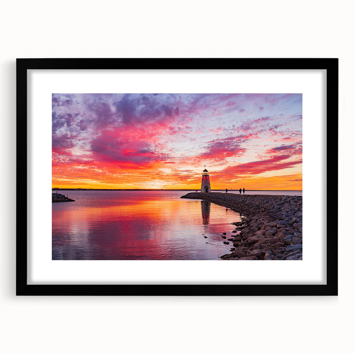 Abstract art print featuring textured, colorful swirls on a large canvas, framed in black, ideal for living room decor.