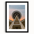 Extra large abstract art print of Seattle skyline in vibrant colors on textured canvas, framed in black.