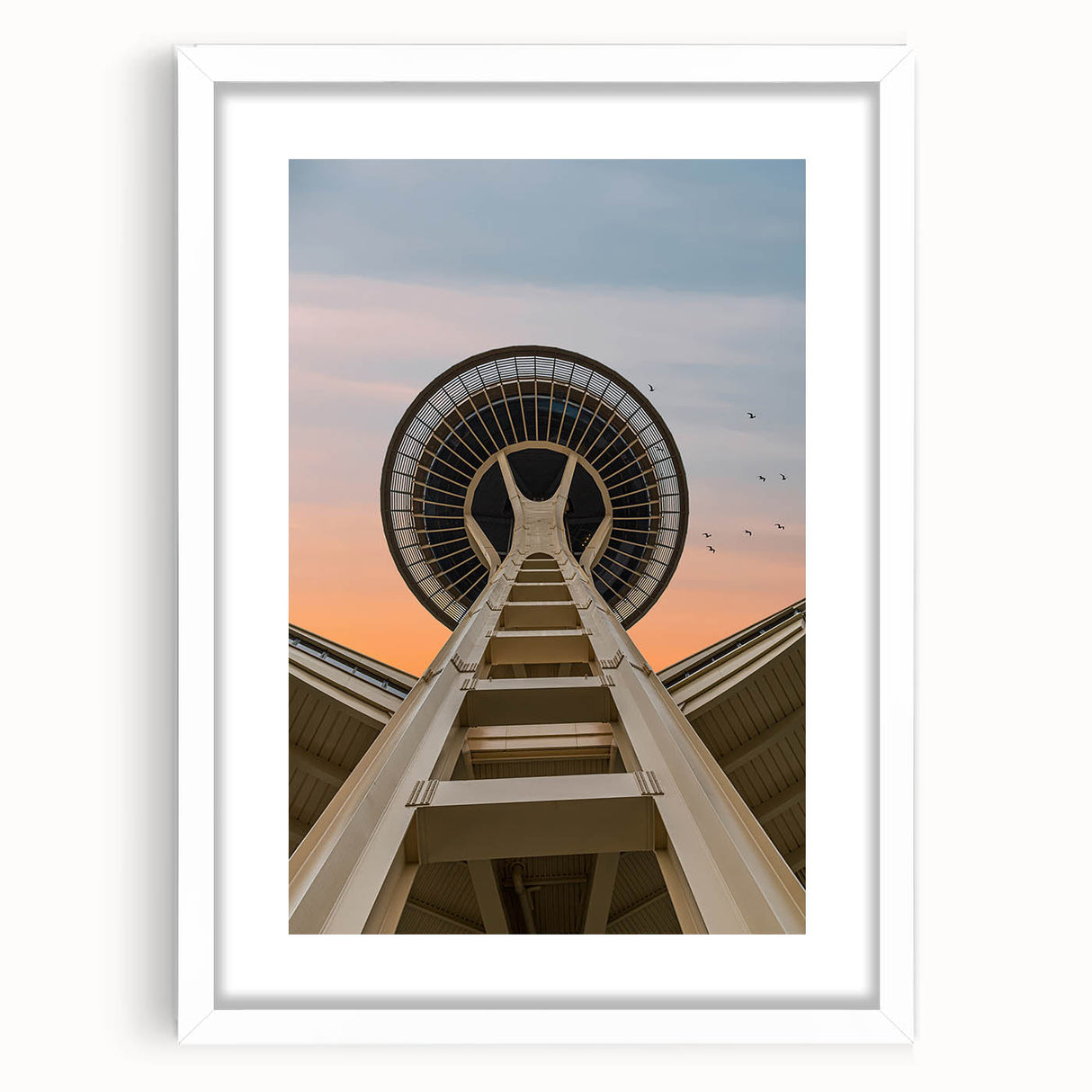 Abstract art print of Seattle skyline in muted gray and blue tones on a framed white mat, ideal for dining room decor.