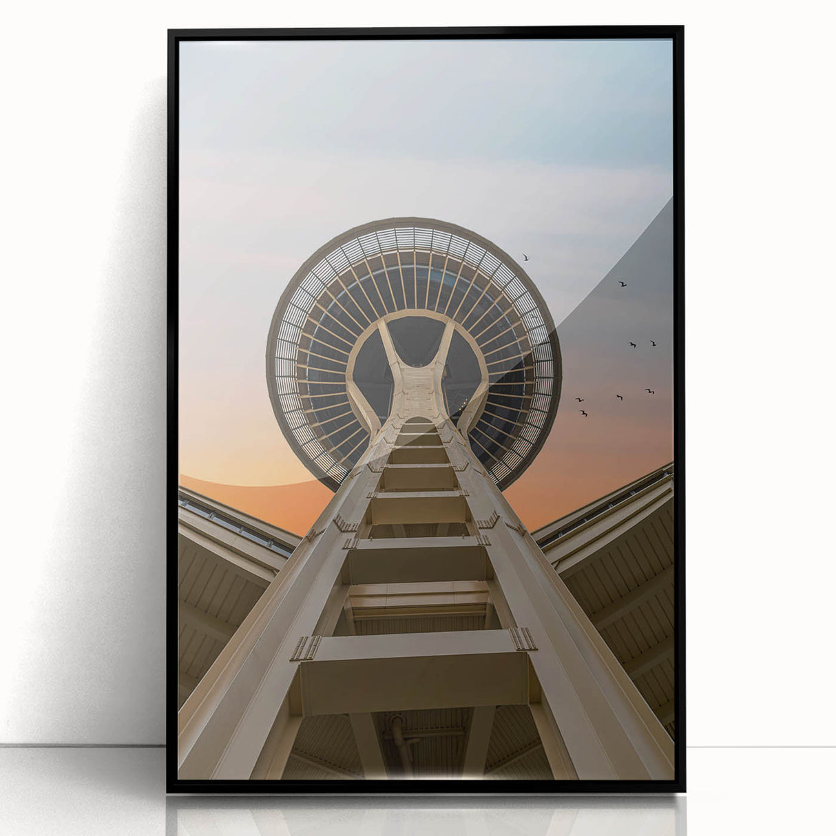 Large abstract wall art depicting Seattle's skyline in muted gray and blue tones on a framed acrylic panel.