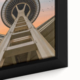 Extra large framed canvas of a textured Seattle skyline in black with colorful accents, ideal for living room decor.
