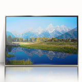 Mid-century modernist art depicting the Grand Tetons in muted earth tones on a framed acrylic.