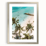 Textured abstract art print in muted gray and blue tones, framed in silver, ideal for modern bedroom ambiance.