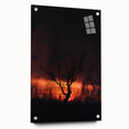Large abstract wall art depicting autumnal trees on acrylic glass, in warm orange and red tones.