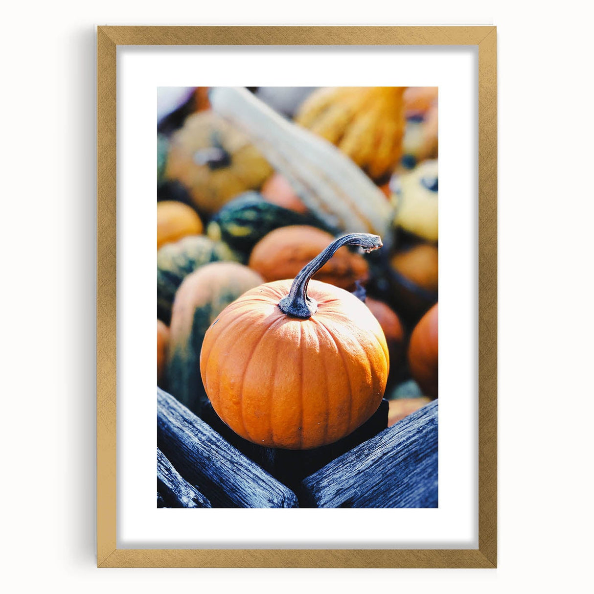 Extra large abstract art print featuring textured autumnal hues in a gold frame, ideal for living room decor.