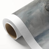 Abstract figurative artwork on rolled canvas showcasing vibrant colors and fluid shapes, elegantly packaged in a protective cardboard tube for display or gifting.