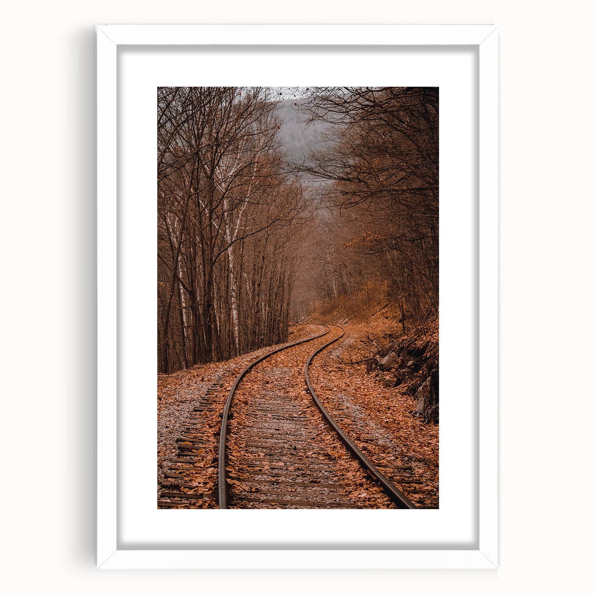 Abstract art print featuring warm autumnal shades on a white framed canvas, ideal for dining room decor.