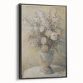Framed canvas artwork showcasing an abstract floral design in vibrant colors, set against a sleek black frame, ideal for modern home decor.