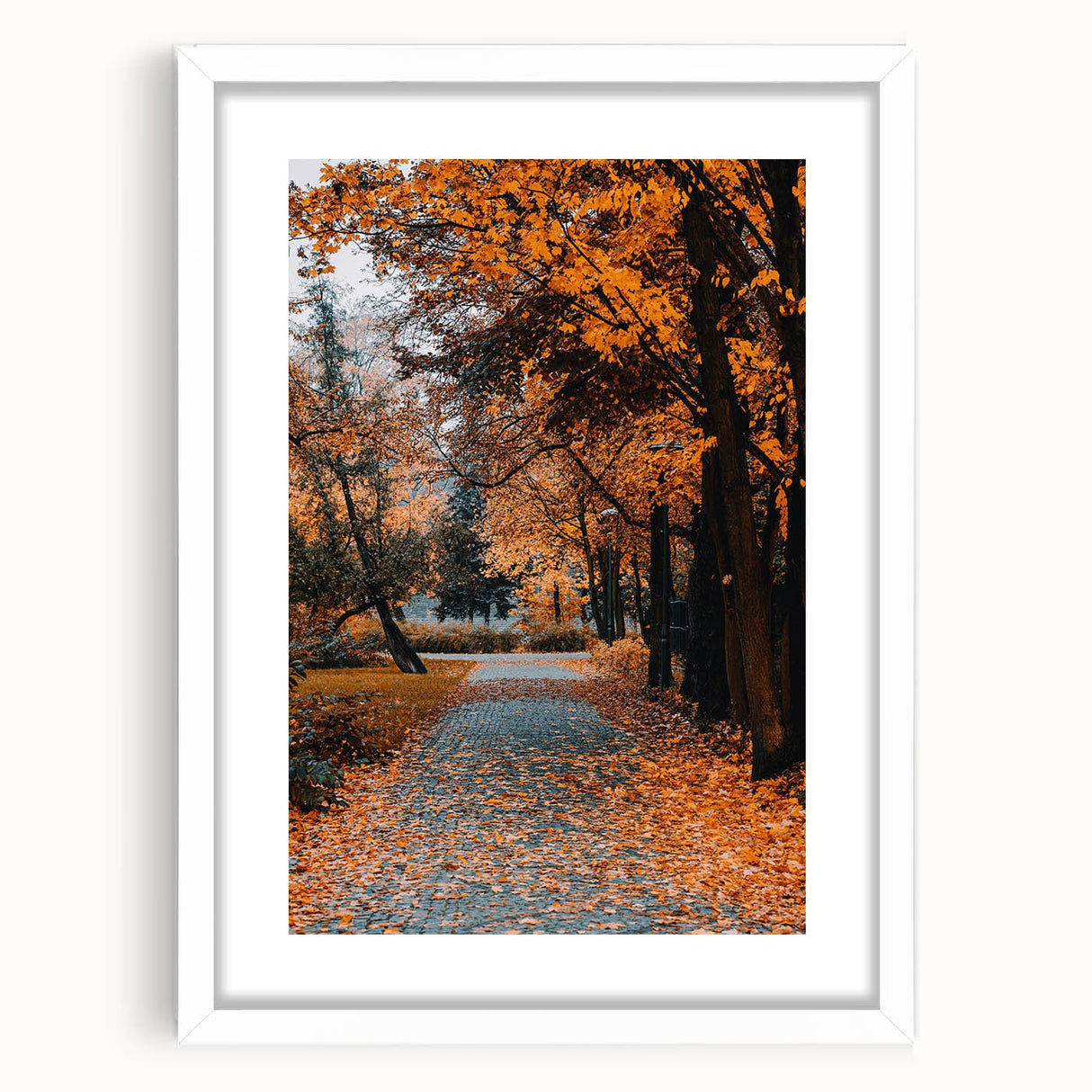 Abstract art print featuring autumnal hues in a white frame, suitable for dining room or bedroom decor.