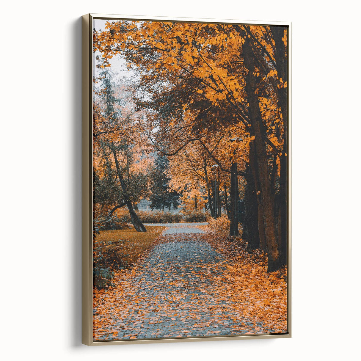 Framed canvas depicting a vintage-style landscape with autumnal trees in gold and black tones, ideal for bedroom wall decor.