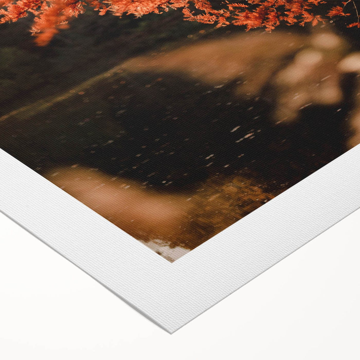 Art deco poster of a stylized fall landscape on rolled canvas, featuring warm orange and brown tones.
