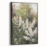 Framed canvas artwork showcasing abstract floral designs in vibrant colors, presented with a sleek black frame for a modern aesthetic, ideal for home decor.