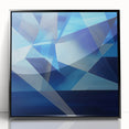 Abstract geometric design framed in sleek black acrylic, showcasing vibrant colors and sharp lines, ideal for modern home decor. Perfect for art enthusiasts seeking a contemporary focal point.