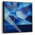 Abstract geometric framed canvas art showcasing a striking black and white design, emphasizing sharp angles and modern aesthetics, ideal for contemporary decor.