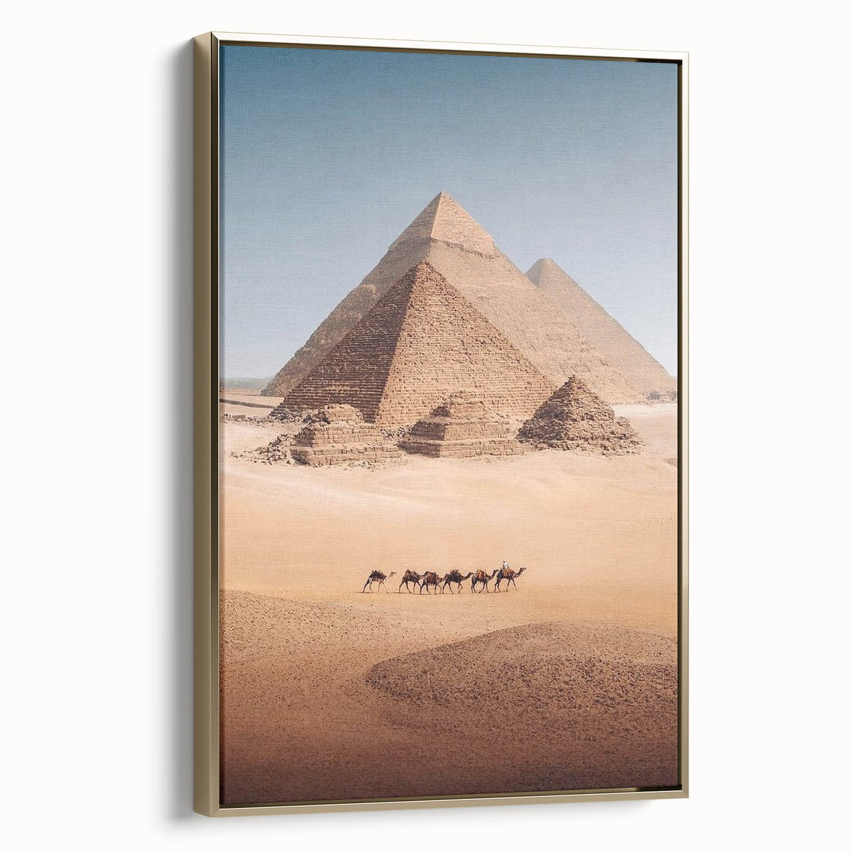 Framed canvas of a vintage-style Egyptian landscape with gold and black tones, ideal for living room decor.