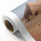 Art deco poster of Egyptian scenery on rolled canvas, featuring muted earth tones.