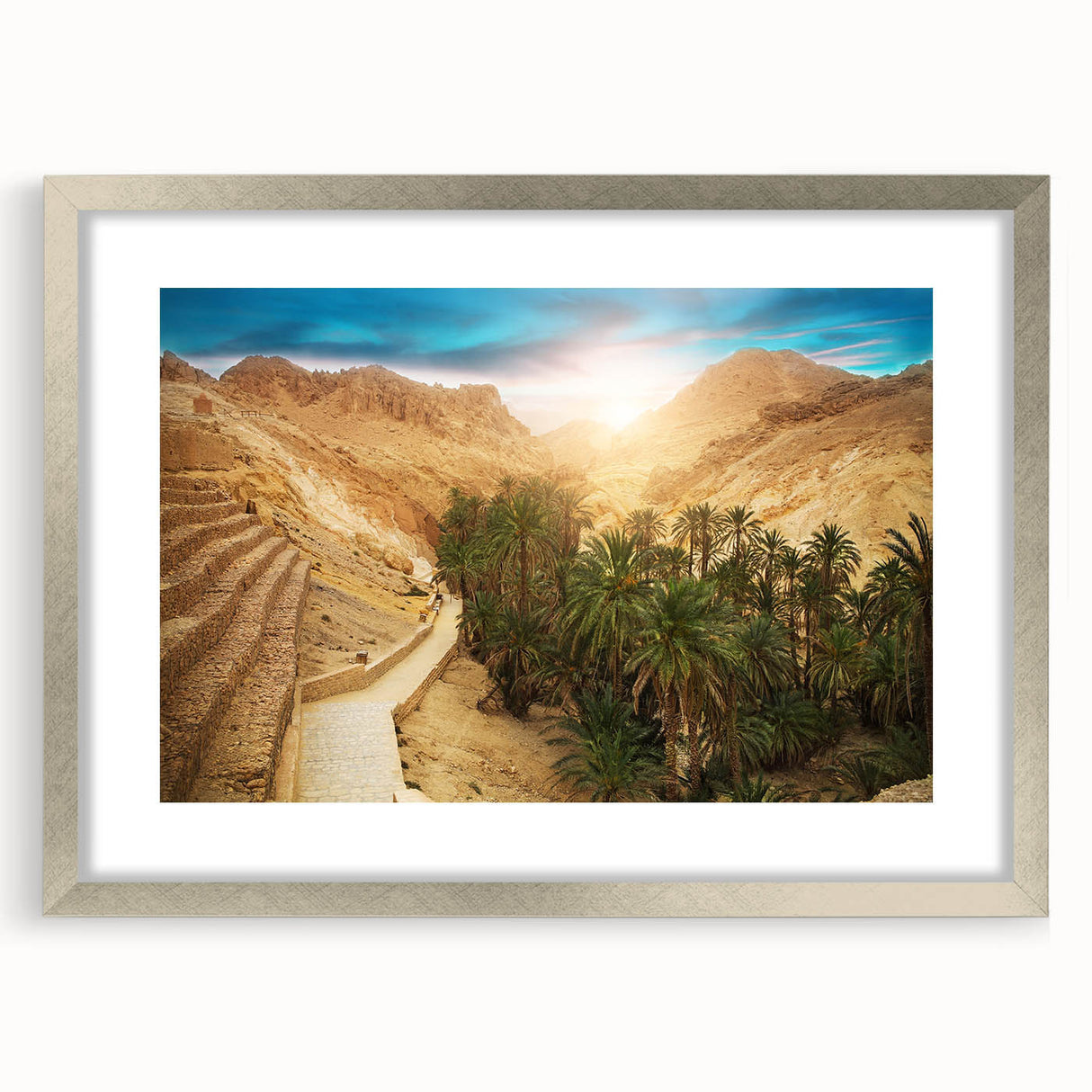 Textured abstract art print depicting a Tunisian landscape in muted earth tones, framed in silver, ideal for bedroom art.