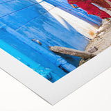 Art deco poster featuring a stylized Indian scenery in vibrant orange and red tones on rolled canvas.