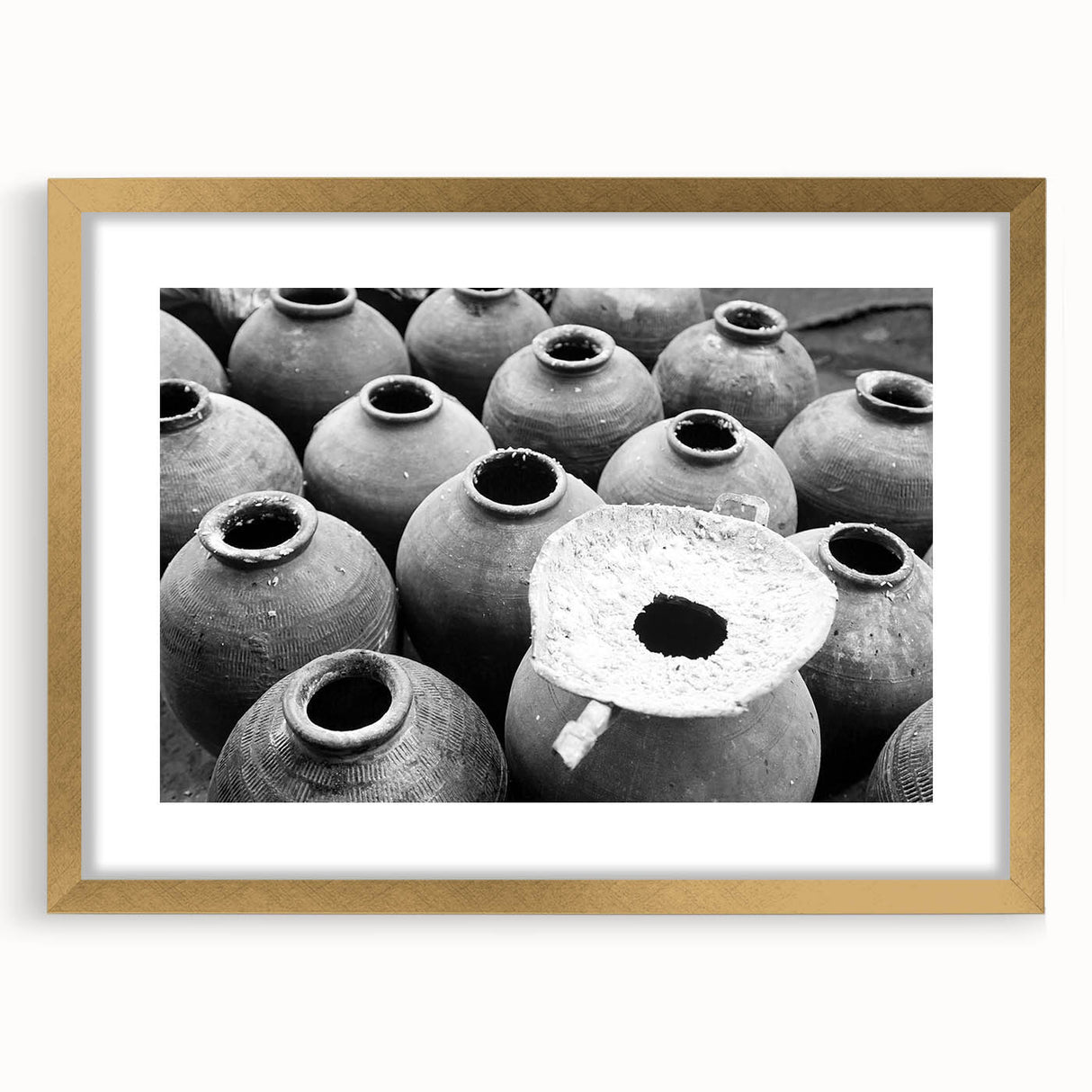 Extra large abstract art print featuring textured scenery of Laos in a gold frame, ideal for living room decor.