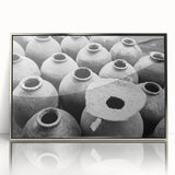 Mid-century modernist art depicting a Laos scenery in muted earth tones on a silver-framed acrylic print.
