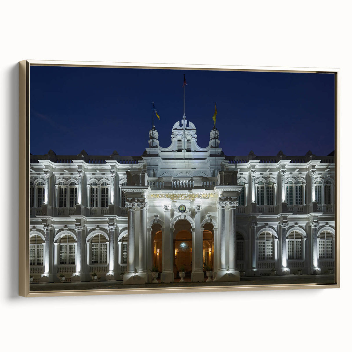 Framed canvas of a vintage-style Malaysian landscape in muted gold and black tones, ideal for bedroom wall art.