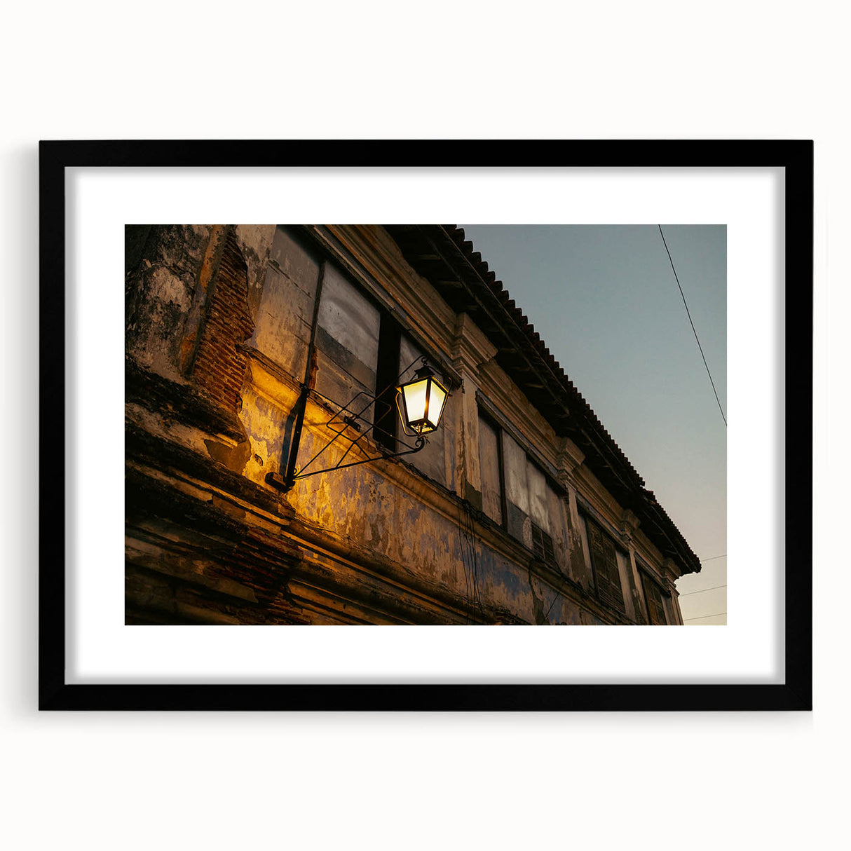 Abstract art print featuring vibrant, colorful textures of a Philippine landscape on a large framed canvas.