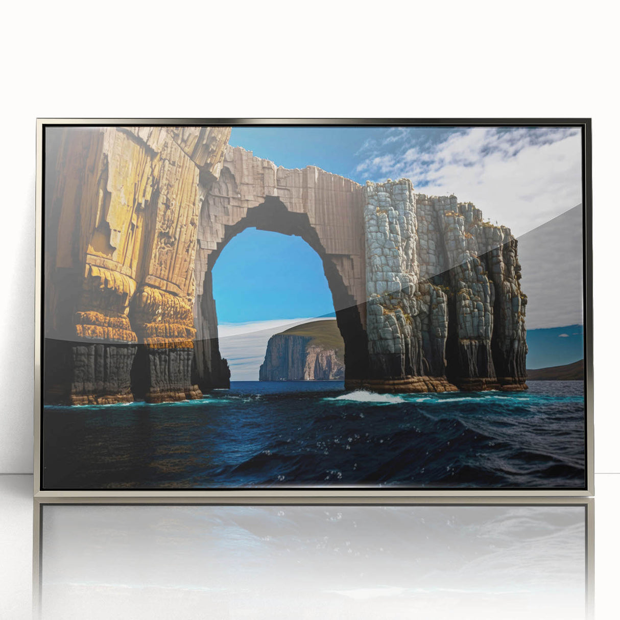 Large art print of a serene Tasmanian landscape in muted green and blue tones, framed in silver acrylic.