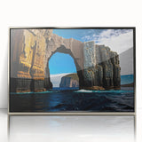 Large art print of a serene Tasmanian landscape in muted green and blue tones, framed in silver acrylic.