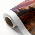 Art Deco poster of British Columbia scenery on rolled canvas, featuring muted green and blue tones.