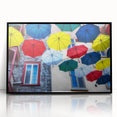 Large abstract wall art depicting a Quebec scenery in muted earth tones on a black framed acrylic.