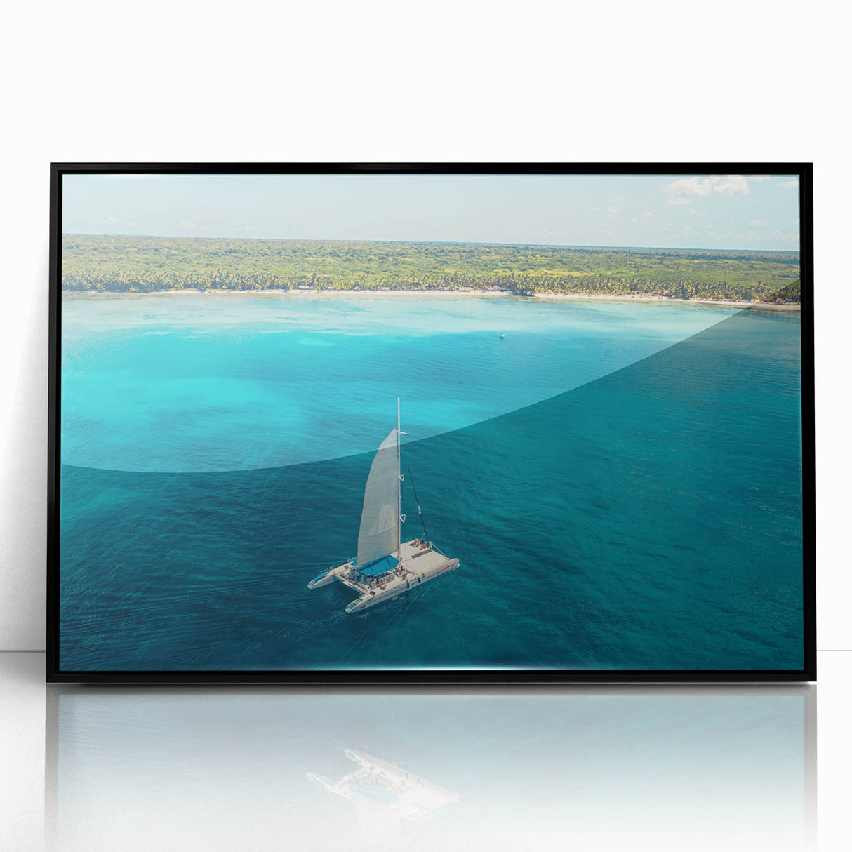 Large abstract wall art depicting Caribbean scenery in vibrant blue and green tones, framed in black acrylic.