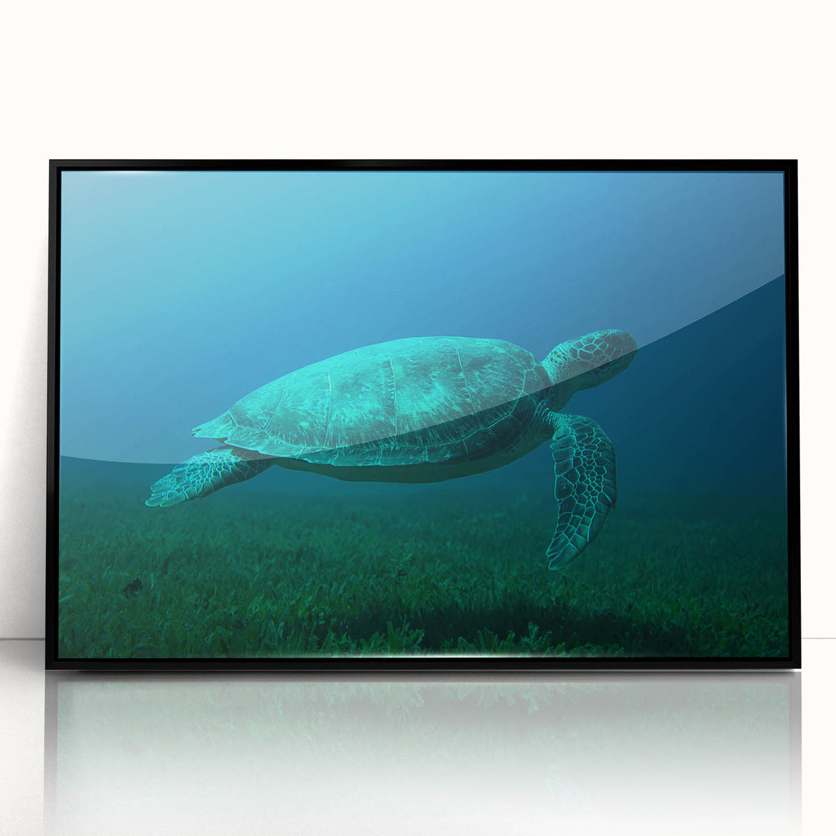 Large abstract wall art depicting Caribbean scenery in vibrant blues and greens, framed in black acrylic.
