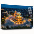 Large abstract wall art depicting a European scenery in muted blue and green on acrylic glass.