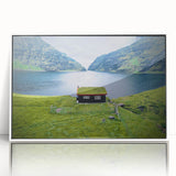 Mid-century modernist art depicting a serene Danish landscape in muted green and blue tones, framed acrylic.