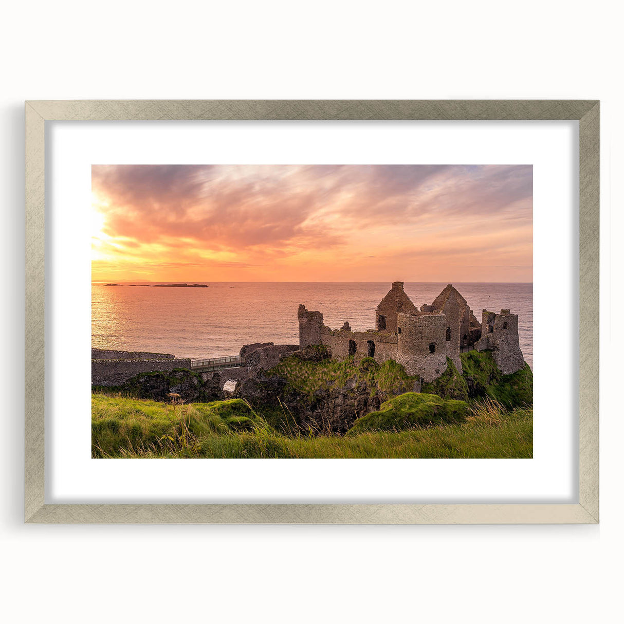 Extra large abstract art print of a textured Irish landscape in muted greens and blues, framed in silver.