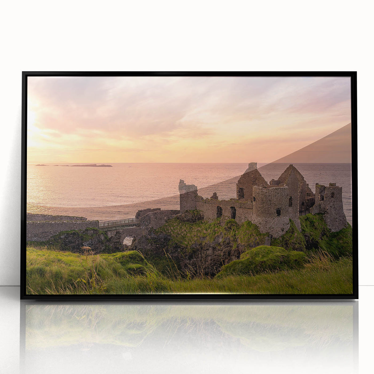 Large abstract wall art depicting a serene Irish landscape in muted green and blue tones, framed in black acrylic.