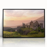 Large abstract wall art depicting a serene Irish landscape in muted green and blue tones, framed in black acrylic.